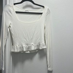 White long sleeve crop top. Super light and soft. Never worn!